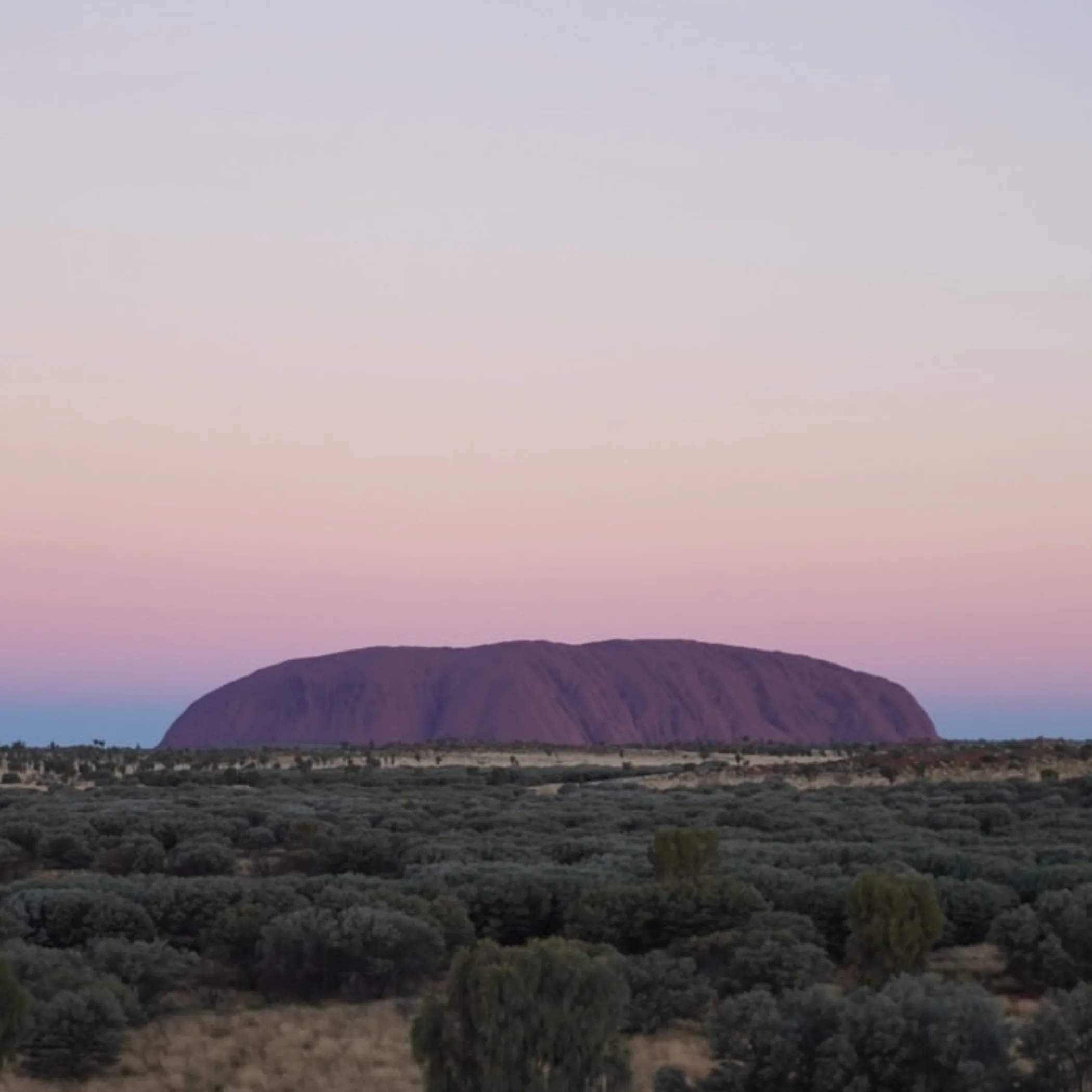 sunglasses reflection uluru rock surface