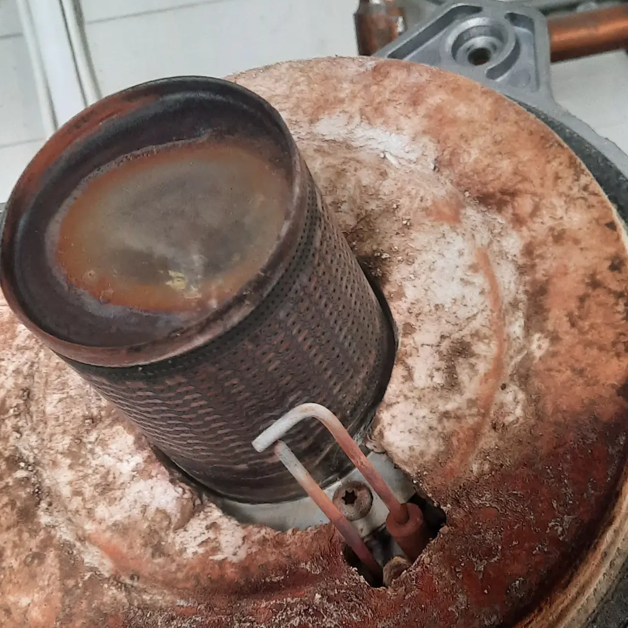 gas appliance undergoing maintenance inspection