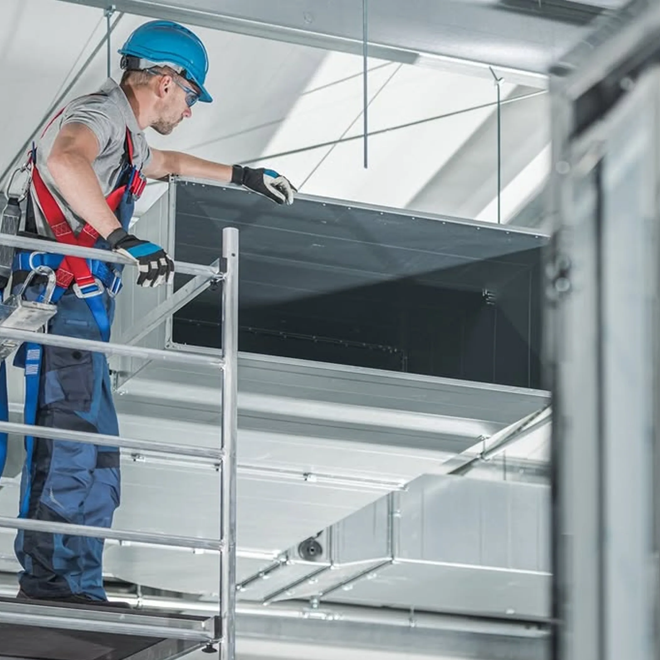 worker using fall protection at height